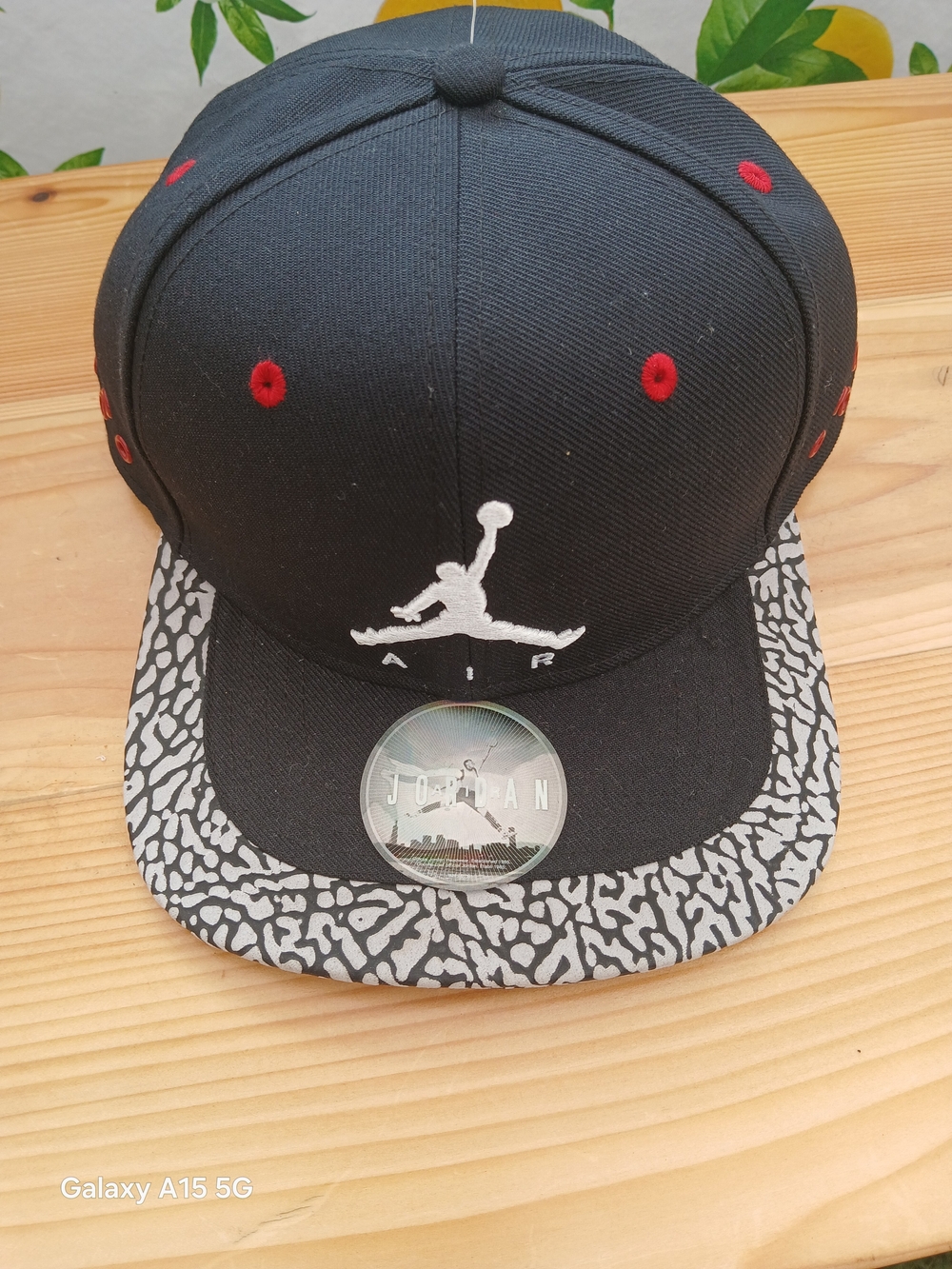 Jordan Black Snapback Cap with White Jumpman and Gray Elephant-Print Brim